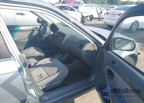 1999 Honda Civic Lx z USA, uszkodzony, nr VIN 2HGEJ6670XH566953